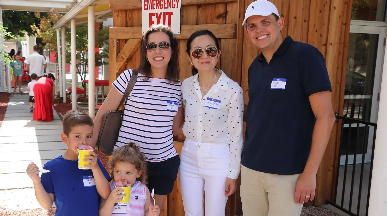 DIS event attendees smile for a photograph.
