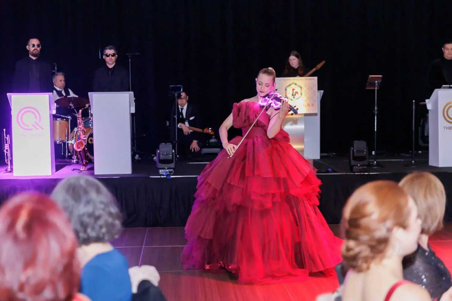 DIS student performs on the violin at the Annual Gala.