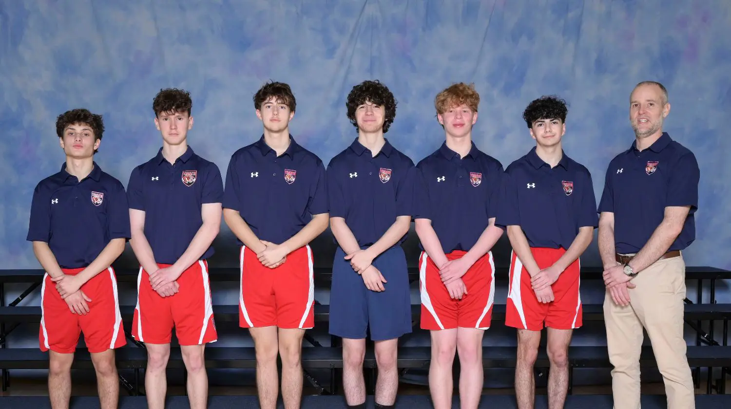 DIS HS Boys Volleyball team photo.