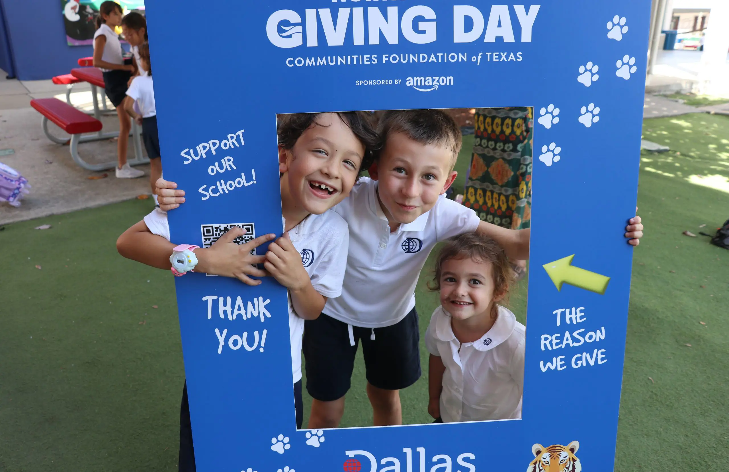 DIS students smile for a photograph on North Texas Giving Day.
