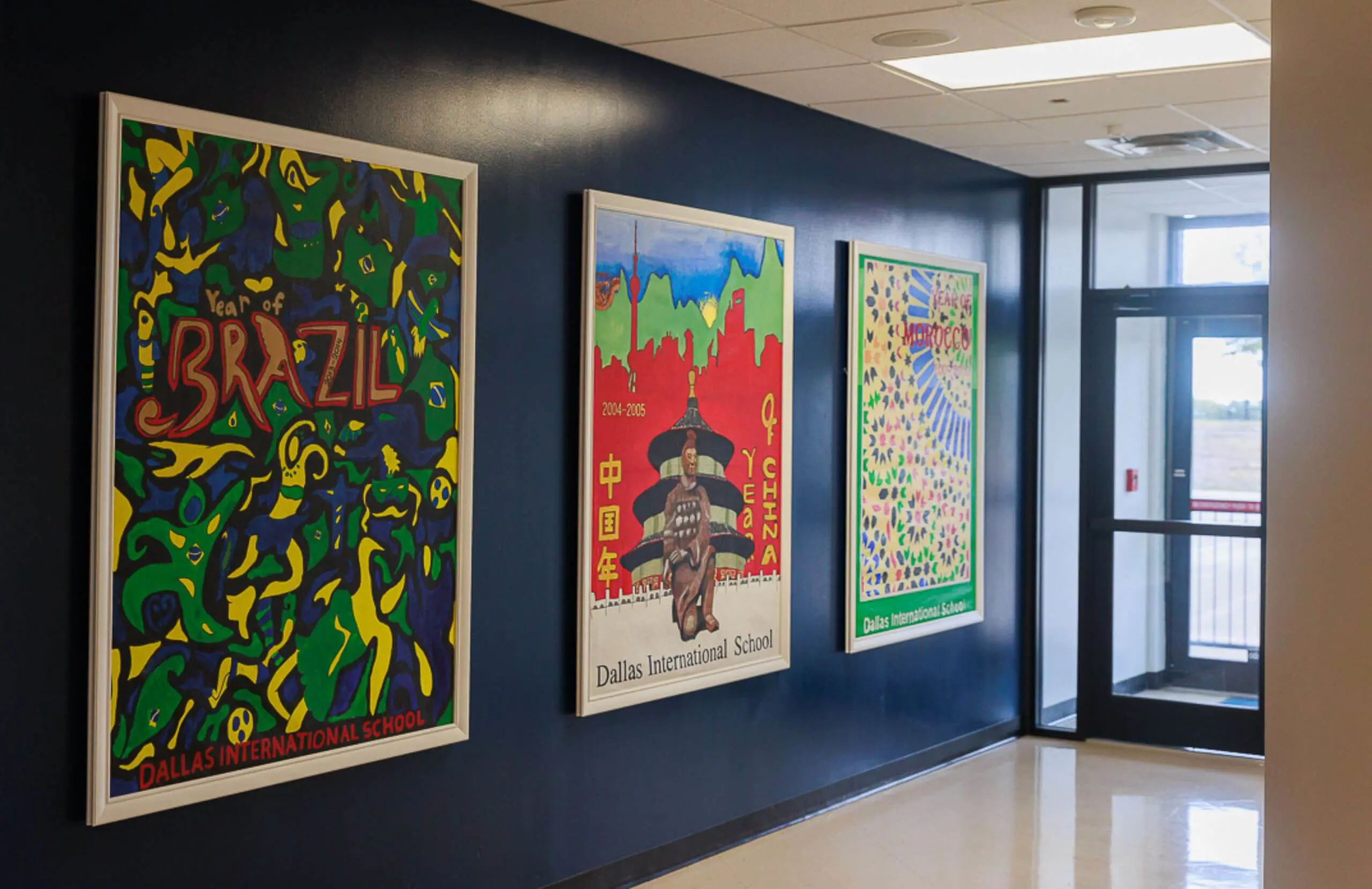 Posters decorating a corridor wall at DIS.