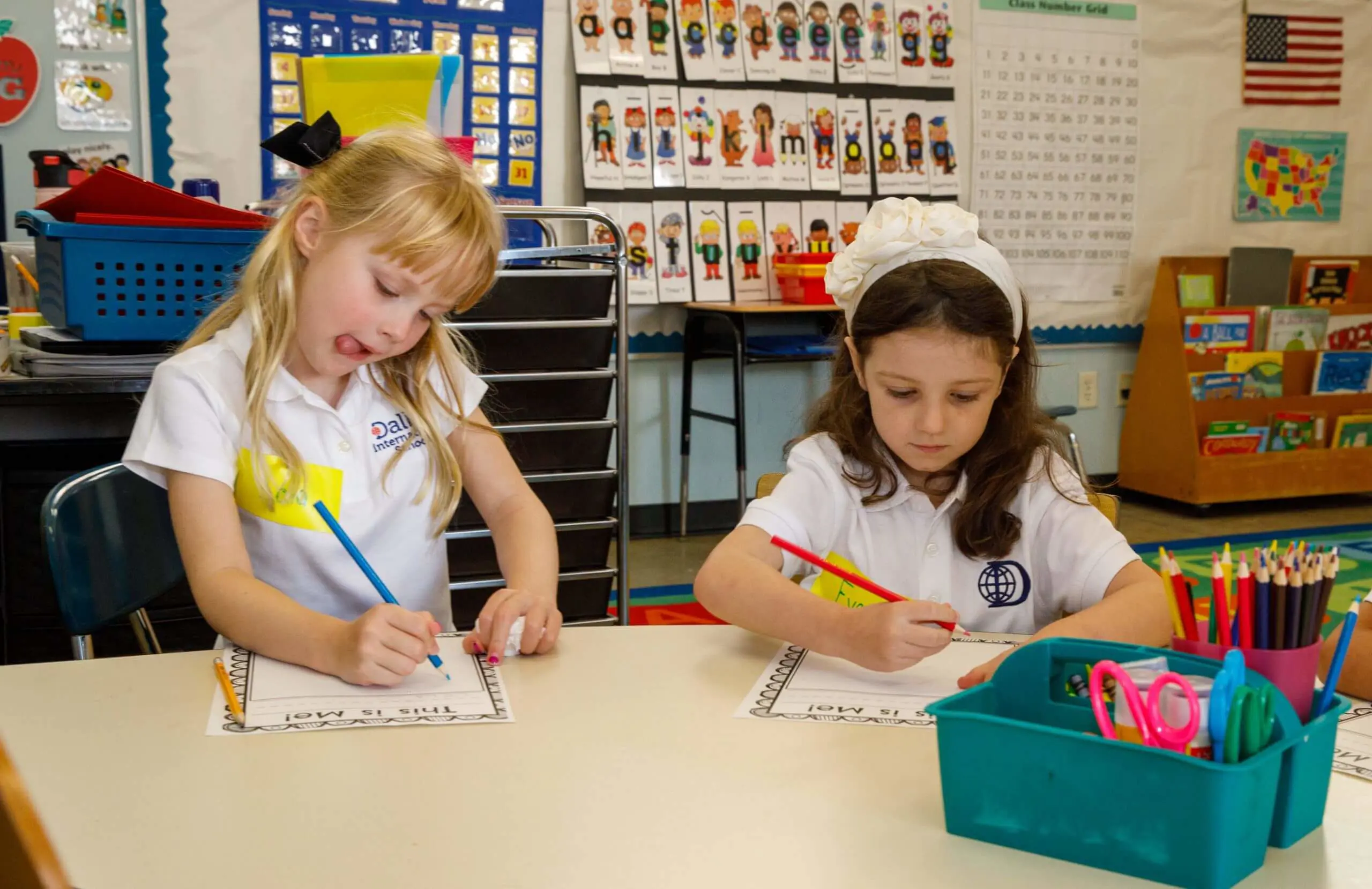 DIS Elementary school students completing classwork together.